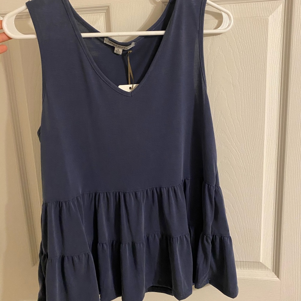 Loved the color and style but never wore it!